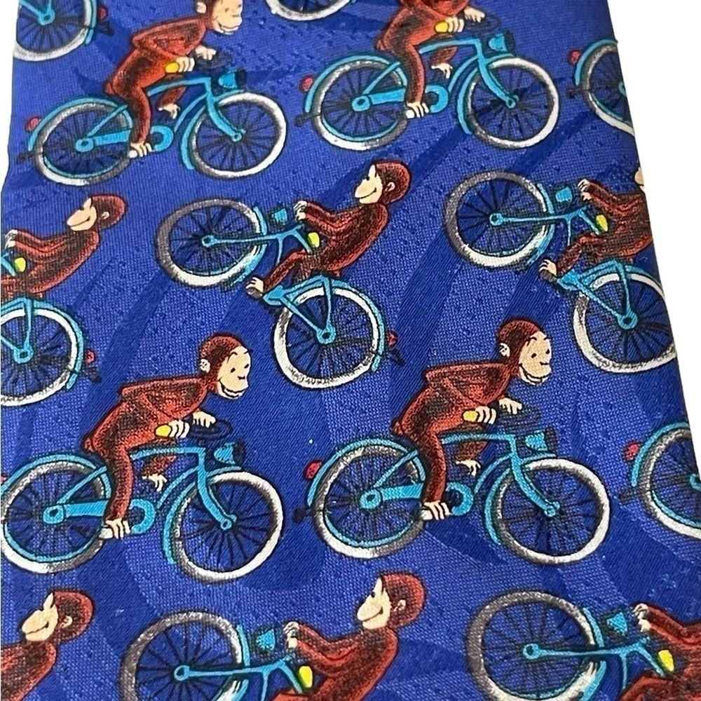 Curious George men’s tie 100% Polyester George on a bicycle Novelty Tie blue